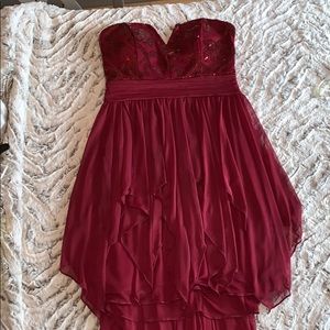 Burgundy sequined high low strapless dress